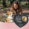 Personalized pet memorial stone gift scene, heart-shaped slate grave marker with photo and "Forever in My Heart" quote, shown with a loving dog owner and her pet, sympathy keepsake for dog and cat loss